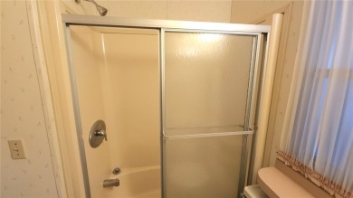 TWO BED, ONE BATH HOME IN ACTIVE 55+ COMMUNITY! This furnished on River Run Golf Links in Florida - for sale on GolfHomes.com, golf home, golf lot