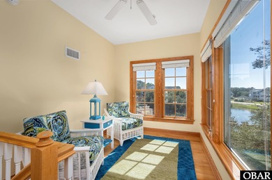 This 5-bedroom, 6.5-bath residence offers over 3,600 square feet on The Currituck Golf Club in North Carolina - for sale on GolfHomes.com, golf home, golf lot