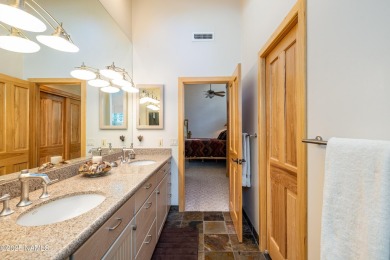 Discover a one-of-a-kind custom residence overlooking Aspen on Aspen Valley Golf Club in Arizona - for sale on GolfHomes.com, golf home, golf lot