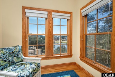 This 5-bedroom, 6.5-bath residence offers over 3,600 square feet on The Currituck Golf Club in North Carolina - for sale on GolfHomes.com, golf home, golf lot
