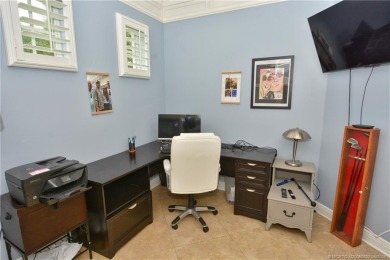 This Bermuda with it's inviting front porch and open-kitchen on The Florida Club in Florida - for sale on GolfHomes.com, golf home, golf lot