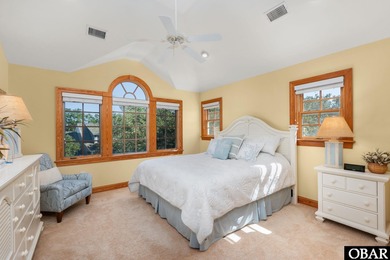 This 5-bedroom, 6.5-bath residence offers over 3,600 square feet on The Currituck Golf Club in North Carolina - for sale on GolfHomes.com, golf home, golf lot