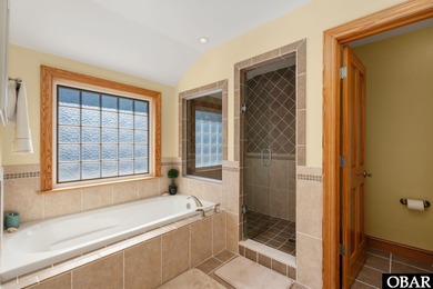 This 5-bedroom, 6.5-bath residence offers over 3,600 square feet on The Currituck Golf Club in North Carolina - for sale on GolfHomes.com, golf home, golf lot