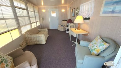 TWO BED, ONE BATH HOME IN ACTIVE 55+ COMMUNITY! This furnished on River Run Golf Links in Florida - for sale on GolfHomes.com, golf home, golf lot