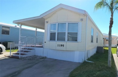 TWO BED, ONE BATH HOME IN ACTIVE 55+ COMMUNITY! This furnished on River Run Golf Links in Florida - for sale on GolfHomes.com, golf home, golf lot