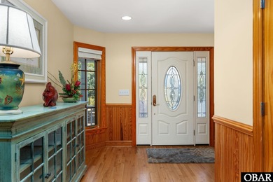 This 5-bedroom, 6.5-bath residence offers over 3,600 square feet on The Currituck Golf Club in North Carolina - for sale on GolfHomes.com, golf home, golf lot