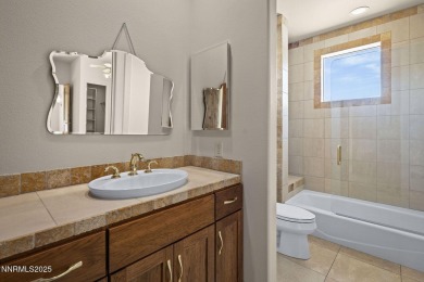 Located in the gated community of Arrowcreek and set on the 7th on ArrowCreek Golf Club - The Challenge in Nevada - for sale on GolfHomes.com, golf home, golf lot