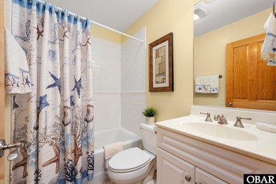 This 5-bedroom, 6.5-bath residence offers over 3,600 square feet on The Currituck Golf Club in North Carolina - for sale on GolfHomes.com, golf home, golf lot