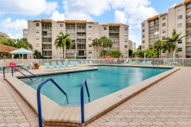 This bright 2-bedroom, 2-bath corner unit offers comfortable on Inverrary Country Club in Florida - for sale on GolfHomes.com, golf home, golf lot