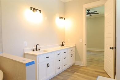 This newly constructed home in the gated Barrington Oaks offers on The Golf Club At Sanctuary Cove in Georgia - for sale on GolfHomes.com, golf home, golf lot