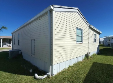 TWO BED, ONE BATH HOME IN ACTIVE 55+ COMMUNITY! This furnished on River Run Golf Links in Florida - for sale on GolfHomes.com, golf home, golf lot