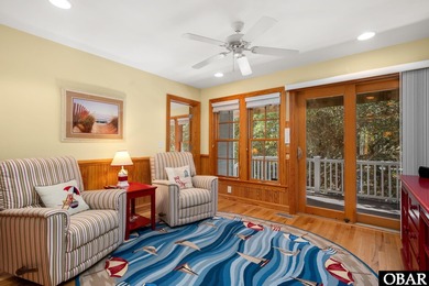 This 5-bedroom, 6.5-bath residence offers over 3,600 square feet on The Currituck Golf Club in North Carolina - for sale on GolfHomes.com, golf home, golf lot