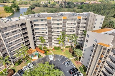 This bright 2-bedroom, 2-bath corner unit offers comfortable on Inverrary Country Club in Florida - for sale on GolfHomes.com, golf home, golf lot