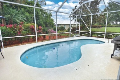 This Bermuda with it's inviting front porch and open-kitchen on The Florida Club in Florida - for sale on GolfHomes.com, golf home, golf lot
