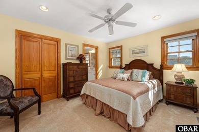 This 5-bedroom, 6.5-bath residence offers over 3,600 square feet on The Currituck Golf Club in North Carolina - for sale on GolfHomes.com, golf home, golf lot