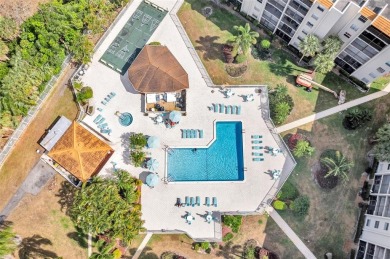 This bright 2-bedroom, 2-bath corner unit offers comfortable on Inverrary Country Club in Florida - for sale on GolfHomes.com, golf home, golf lot