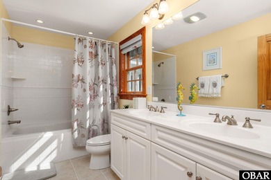 This 5-bedroom, 6.5-bath residence offers over 3,600 square feet on The Currituck Golf Club in North Carolina - for sale on GolfHomes.com, golf home, golf lot