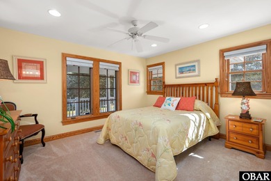 This 5-bedroom, 6.5-bath residence offers over 3,600 square feet on The Currituck Golf Club in North Carolina - for sale on GolfHomes.com, golf home, golf lot