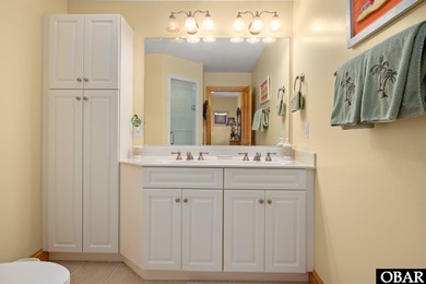 This 5-bedroom, 6.5-bath residence offers over 3,600 square feet on The Currituck Golf Club in North Carolina - for sale on GolfHomes.com, golf home, golf lot