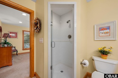 This 5-bedroom, 6.5-bath residence offers over 3,600 square feet on The Currituck Golf Club in North Carolina - for sale on GolfHomes.com, golf home, golf lot