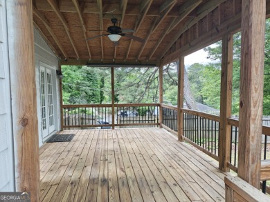 No HOA - Discover the perfect blend of contemporary elegance and on Charlie Yates Golf Course in Georgia - for sale on GolfHomes.com, golf home, golf lot
