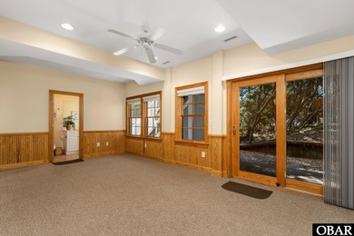 This 5-bedroom, 6.5-bath residence offers over 3,600 square feet on The Currituck Golf Club in North Carolina - for sale on GolfHomes.com, golf home, golf lot