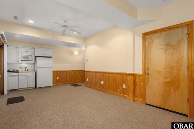 This 5-bedroom, 6.5-bath residence offers over 3,600 square feet on The Currituck Golf Club in North Carolina - for sale on GolfHomes.com, golf home, golf lot