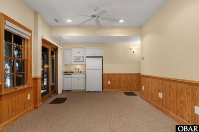 This 5-bedroom, 6.5-bath residence offers over 3,600 square feet on The Currituck Golf Club in North Carolina - for sale on GolfHomes.com, golf home, golf lot
