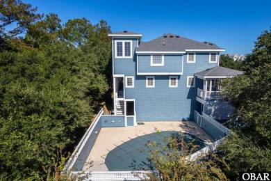 This 5-bedroom, 6.5-bath residence offers over 3,600 square feet on The Currituck Golf Club in North Carolina - for sale on GolfHomes.com, golf home, golf lot