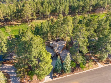 Discover a one-of-a-kind custom residence overlooking Aspen on Aspen Valley Golf Club in Arizona - for sale on GolfHomes.com, golf home, golf lot