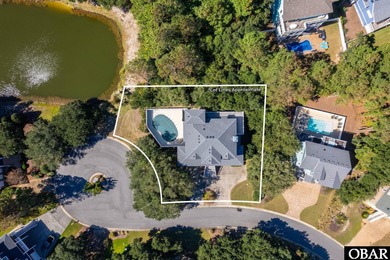 This 5-bedroom, 6.5-bath residence offers over 3,600 square feet on The Currituck Golf Club in North Carolina - for sale on GolfHomes.com, golf home, golf lot
