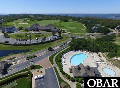 This 5-bedroom, 6.5-bath residence offers over 3,600 square feet on The Currituck Golf Club in North Carolina - for sale on GolfHomes.com, golf home, golf lot