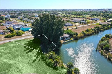 Enjoy beautiful intersecting canal views and a long, peaceful on Burnt Store Golf Club in Florida - for sale on GolfHomes.com, golf home, golf lot