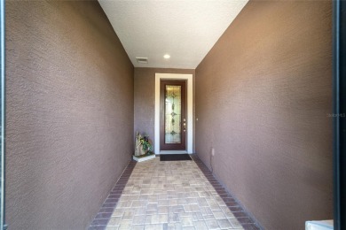 Fall in love with this beautifully upgraded Abbeyville model on Stone Creek Golf Club in Florida - for sale on GolfHomes.com, golf home, golf lot
