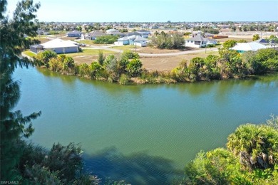 Enjoy beautiful intersecting canal views and a long, peaceful on Burnt Store Golf Club in Florida - for sale on GolfHomes.com, golf home, golf lot