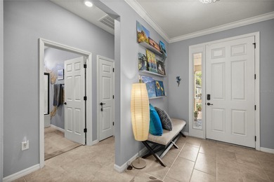 Warm & Inviting Former Model Home in Indigo East -- Upgraded on Candler Hills Golf and Country Club in Florida - for sale on GolfHomes.com, golf home, golf lot