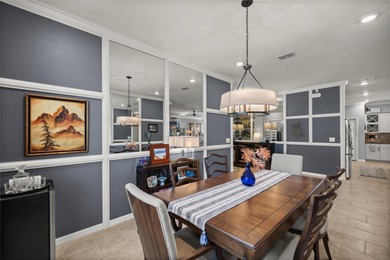 Warm & Inviting Former Model Home in Indigo East -- Upgraded on Candler Hills Golf and Country Club in Florida - for sale on GolfHomes.com, golf home, golf lot