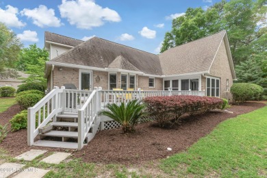 Tucked at the end of a cul-de-sac, this stunning brick home on Lockwood Folly Country Club in North Carolina - for sale on GolfHomes.com, golf home, golf lot