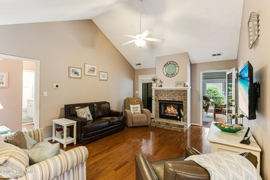 Tucked at the end of a cul-de-sac, this stunning brick home on Lockwood Folly Country Club in North Carolina - for sale on GolfHomes.com, golf home, golf lot