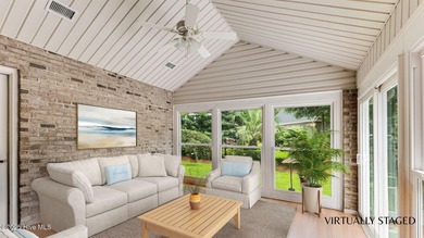 Tucked at the end of a cul-de-sac, this stunning brick home on Lockwood Folly Country Club in North Carolina - for sale on GolfHomes.com, golf home, golf lot