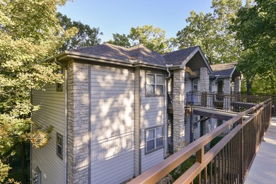 Step inside this 2-bedroom, 2.5-bath condo to find a on Ledgestone Country Club and Golf Course in Missouri - for sale on GolfHomes.com, golf home, golf lot