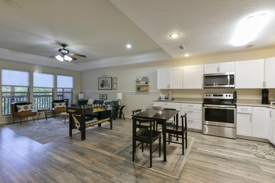 Step inside this 2-bedroom, 2.5-bath condo to find a on Ledgestone Country Club and Golf Course in Missouri - for sale on GolfHomes.com, golf home, golf lot