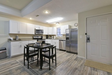 Step inside this 2-bedroom, 2.5-bath condo to find a on Ledgestone Country Club and Golf Course in Missouri - for sale on GolfHomes.com, golf home, golf lot