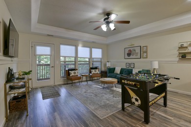 Step inside this 2-bedroom, 2.5-bath condo to find a on Ledgestone Country Club and Golf Course in Missouri - for sale on GolfHomes.com, golf home, golf lot
