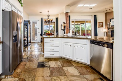 Welcome to this stunning Estrella custom home, situated on 1/2 on Estrella Mountain Ranch Golf Course in Arizona - for sale on GolfHomes.com, golf home, golf lot
