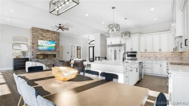 2023 construction, stunning home and is TURNKEY! Stucco & stone on The Club At Porto Cima in Missouri - for sale on GolfHomes.com, golf home, golf lot