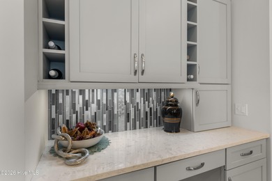 Experience the pinnacle of coastal elegance in this like-new on Members Club At St. James Plantation in North Carolina - for sale on GolfHomes.com, golf home, golf lot