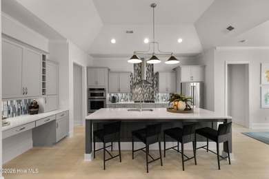 Experience the pinnacle of coastal elegance in this like-new on Members Club At St. James Plantation in North Carolina - for sale on GolfHomes.com, golf home, golf lot