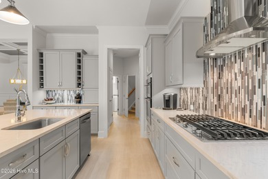 Experience the pinnacle of coastal elegance in this like-new on Members Club At St. James Plantation in North Carolina - for sale on GolfHomes.com, golf home, golf lot