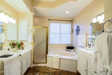 Welcome to this stunning Estrella custom home, situated on 1/2 on Estrella Mountain Ranch Golf Course in Arizona - for sale on GolfHomes.com, golf home, golf lot